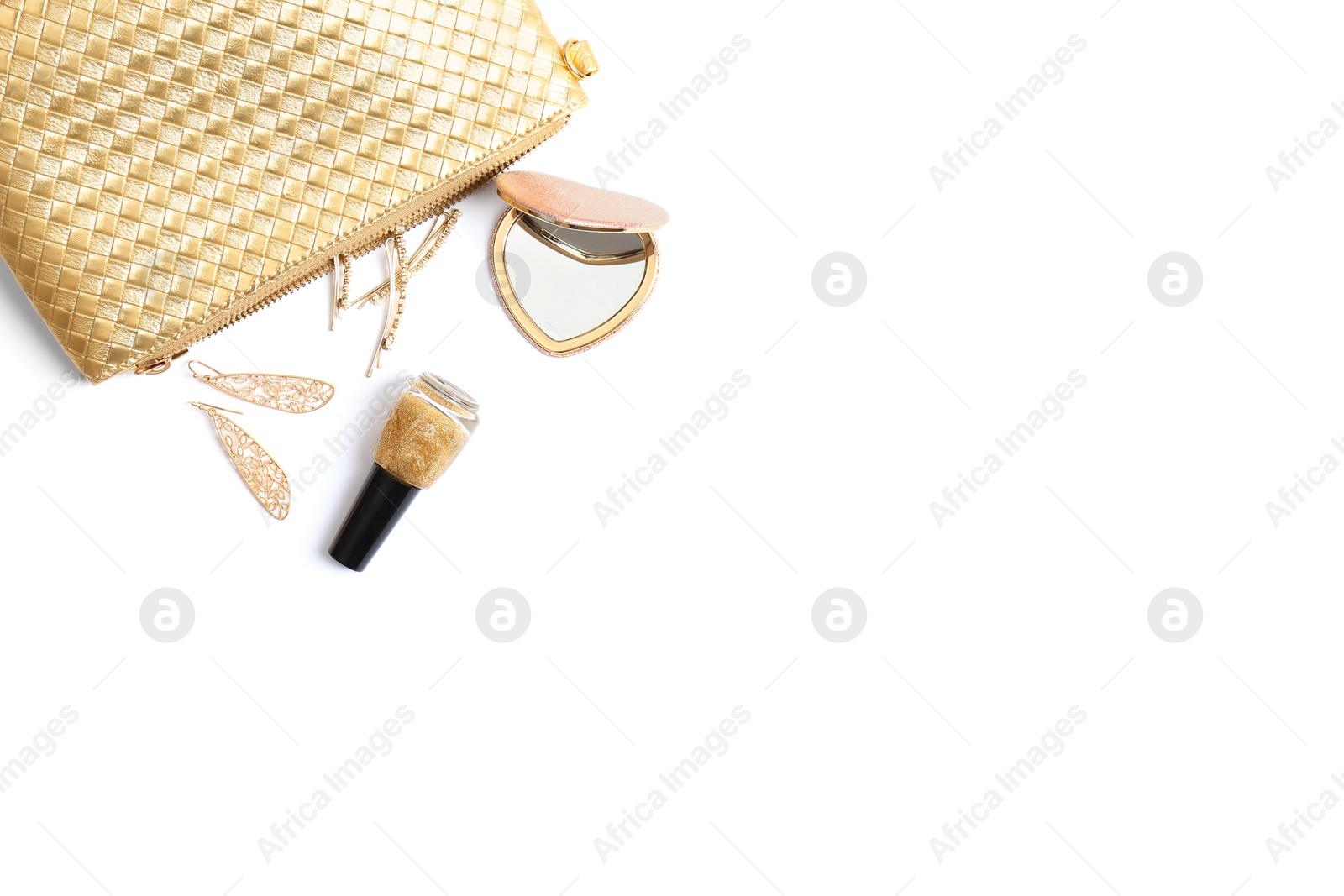 Photo of Gold cosmetic bag and accessories isolated on white, flat lay