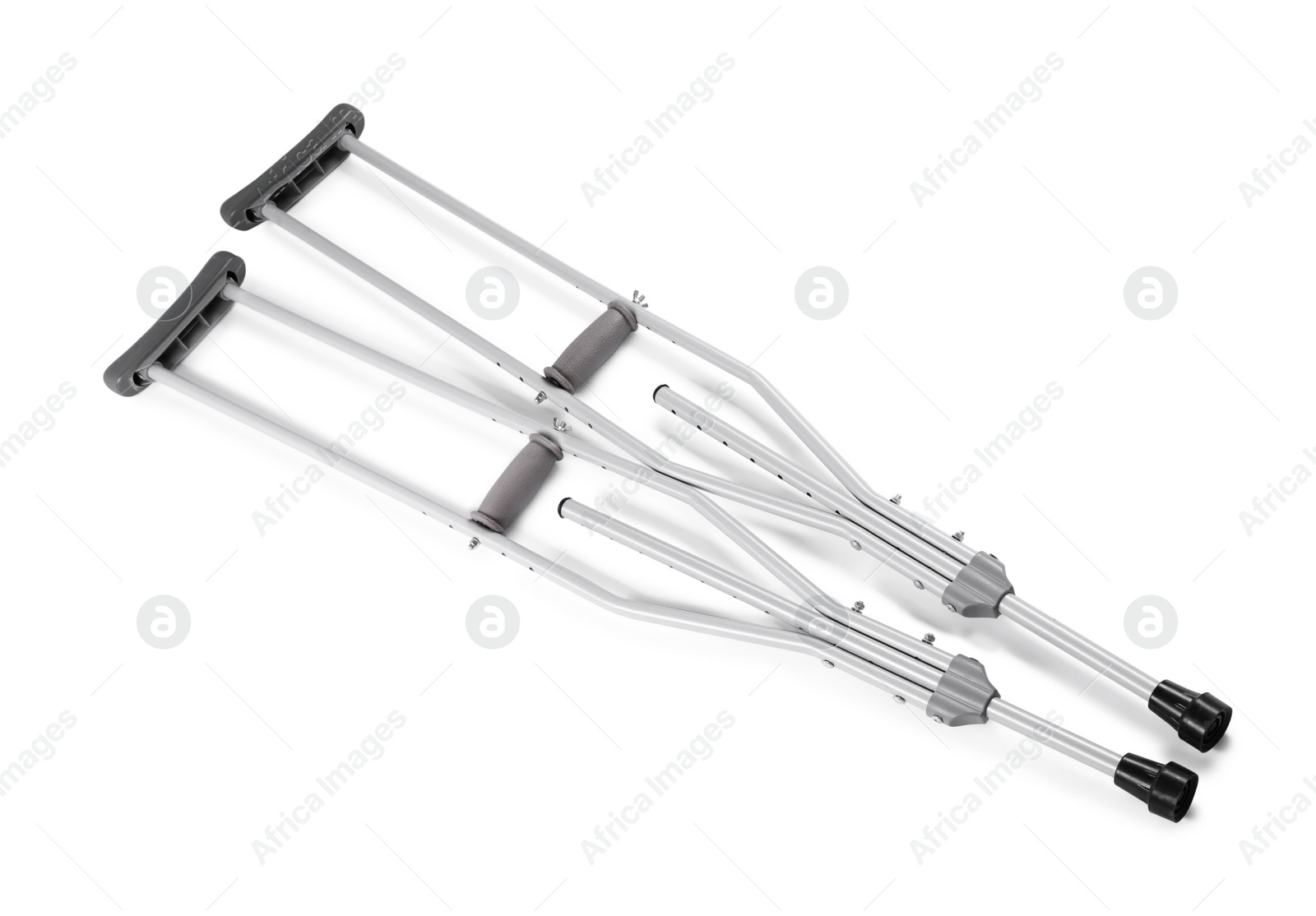 Photo of Pair of axillary crutches on white background
