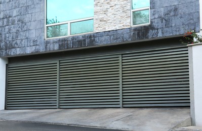 Photo of Closed roller shutter gates of modern garage