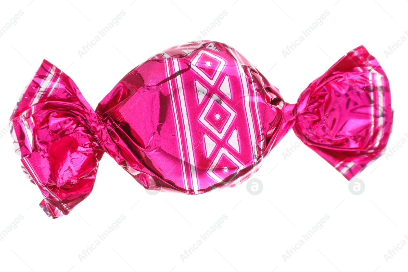 Photo of Candy in bright pink wrapper isolated on white