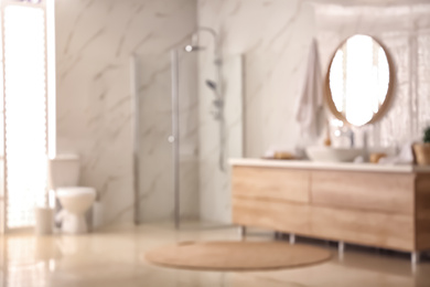 Photo of Blurred view of stylish modern bathroom interior