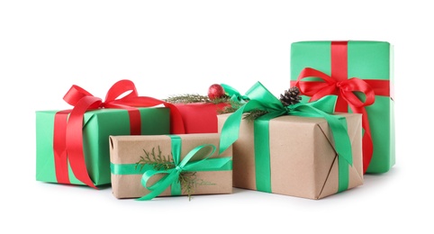 Different Christmas gift boxes on white background