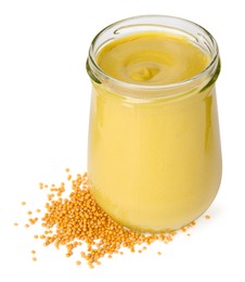 Glass jar of tasty mustard sauce and dry seeds isolated on white