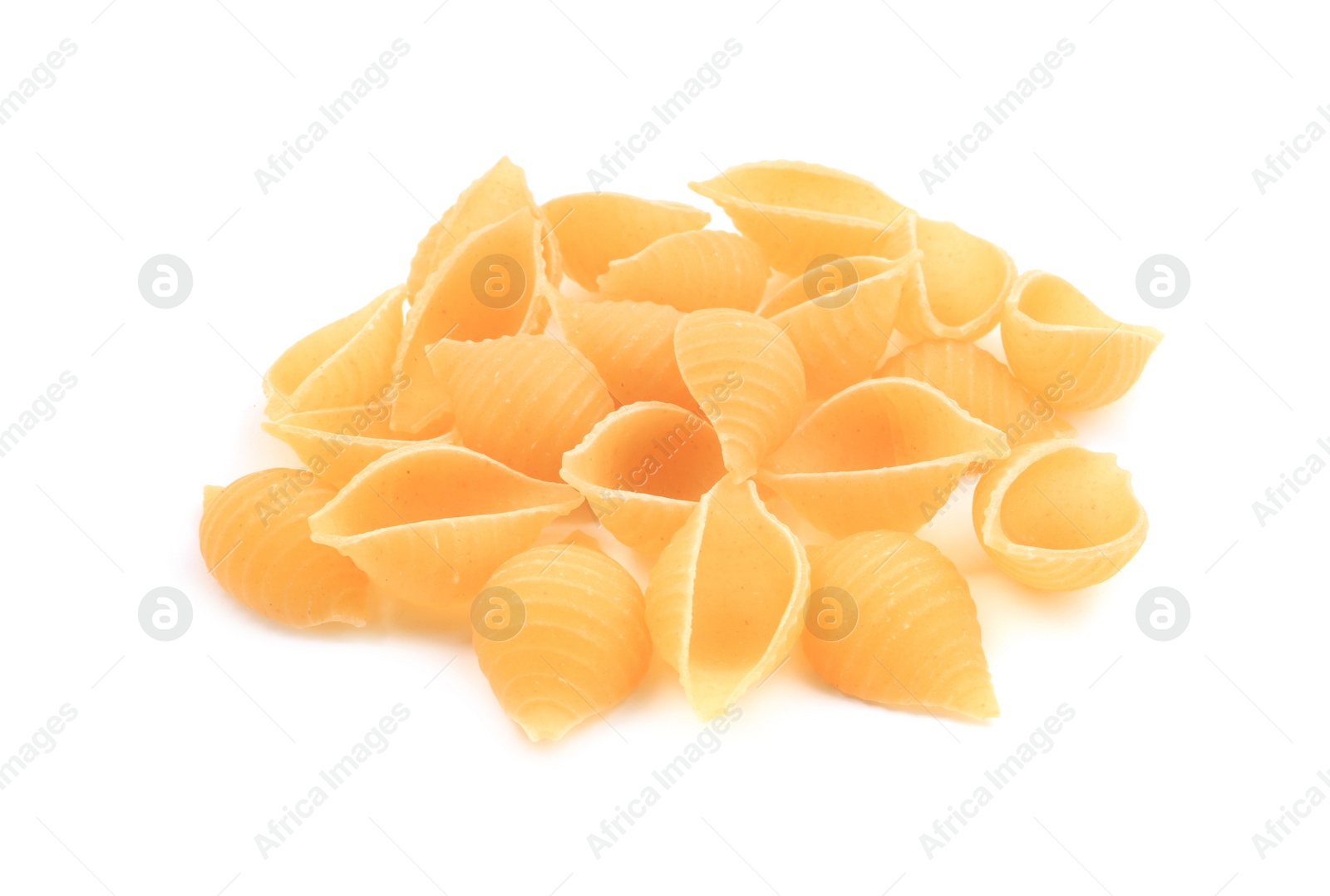 Photo of Pile of raw conchiglie pasta isolated on white