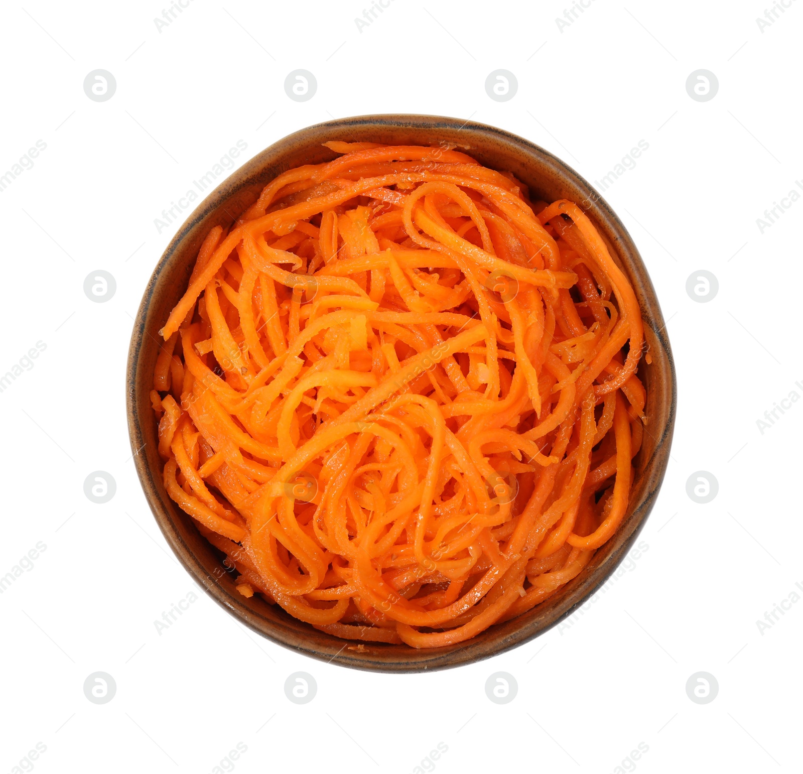 Photo of Delicious Korean carrot salad in bowl isolated on white, top view