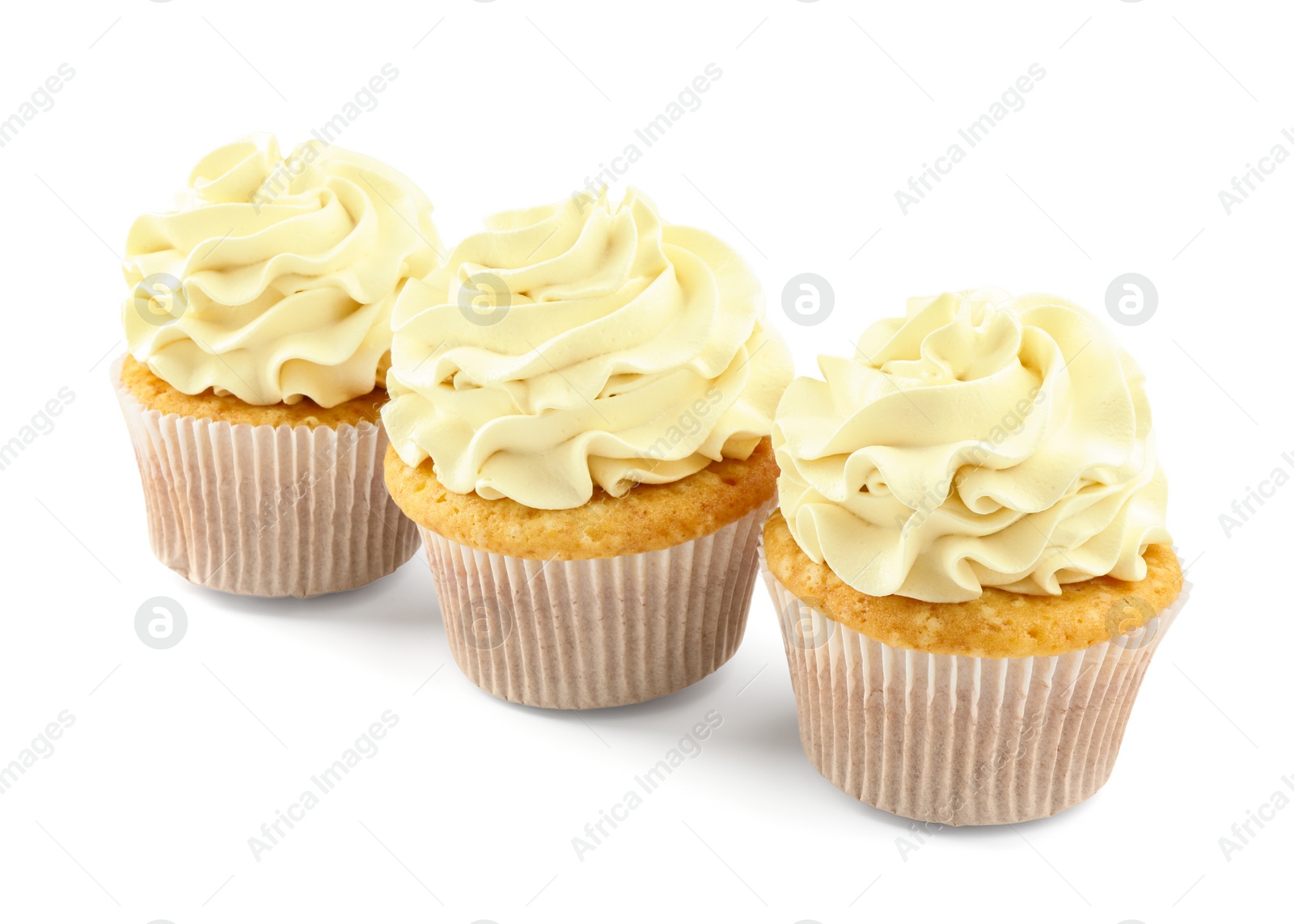 Photo of Tasty vanilla cupcakes with cream isolated on white