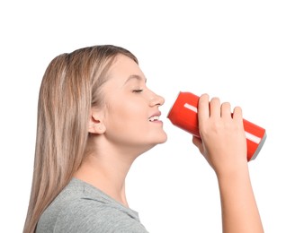 Photo of Beautiful woman drinking from beverage can on white background