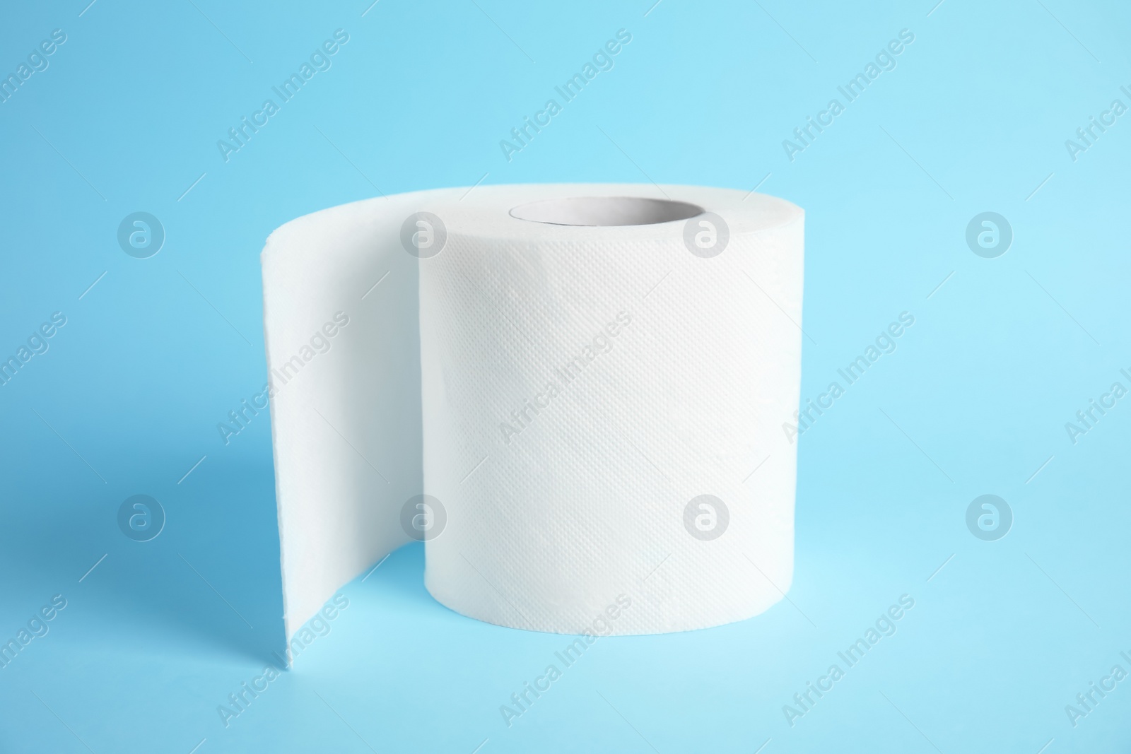 Photo of Toilet paper roll on color background. Personal hygiene