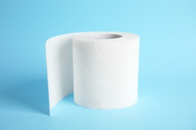 Photo of Toilet paper roll on color background. Personal hygiene