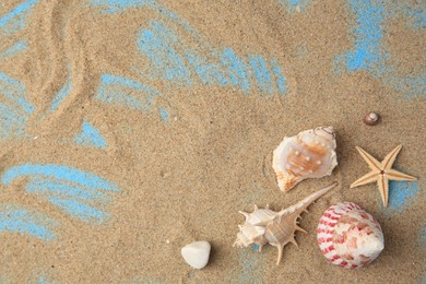 Beautiful starfish, shells and sand on blue background, flat lay. Space for text