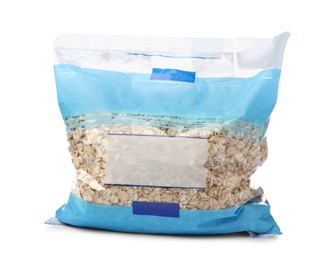 Photo of Raw oatmeal in package isolated on white