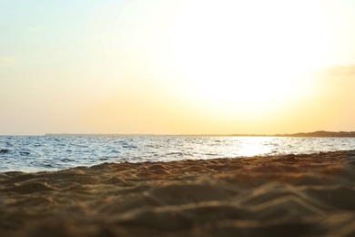 Photo of Beautiful view of sandy beach on sunset