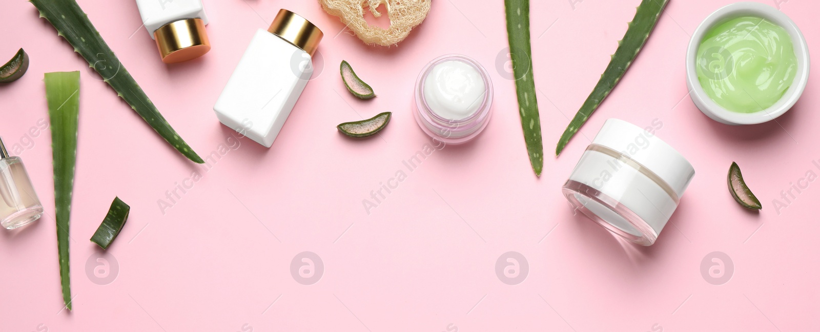 Image of Flat lay composition with aloe vera and cosmetic products on pink background. Banner design