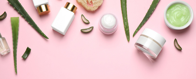 Image of Flat lay composition with aloe vera and cosmetic products on pink background. Banner design