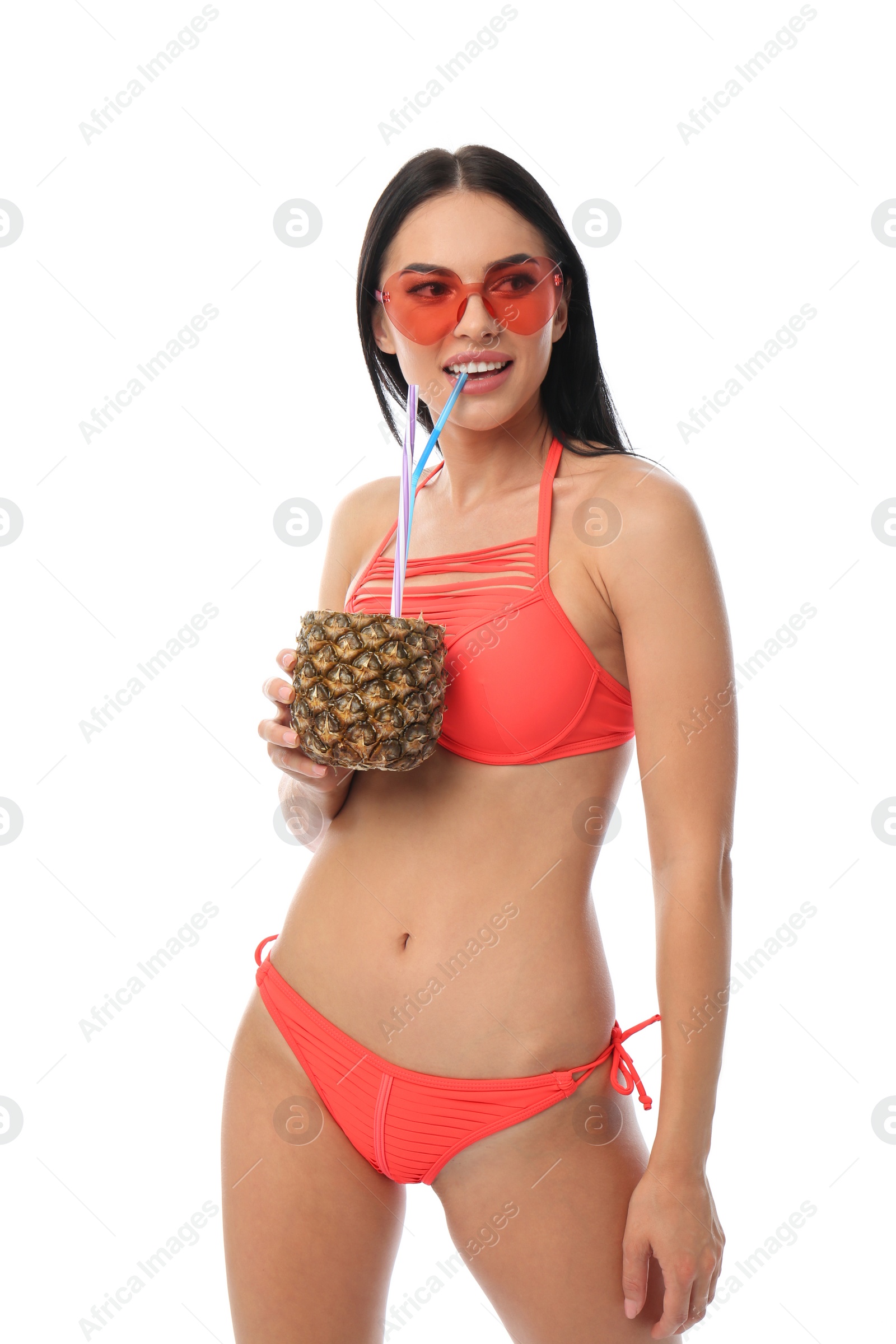 Photo of Beautiful young woman in stylish bikini with cocktail on white background