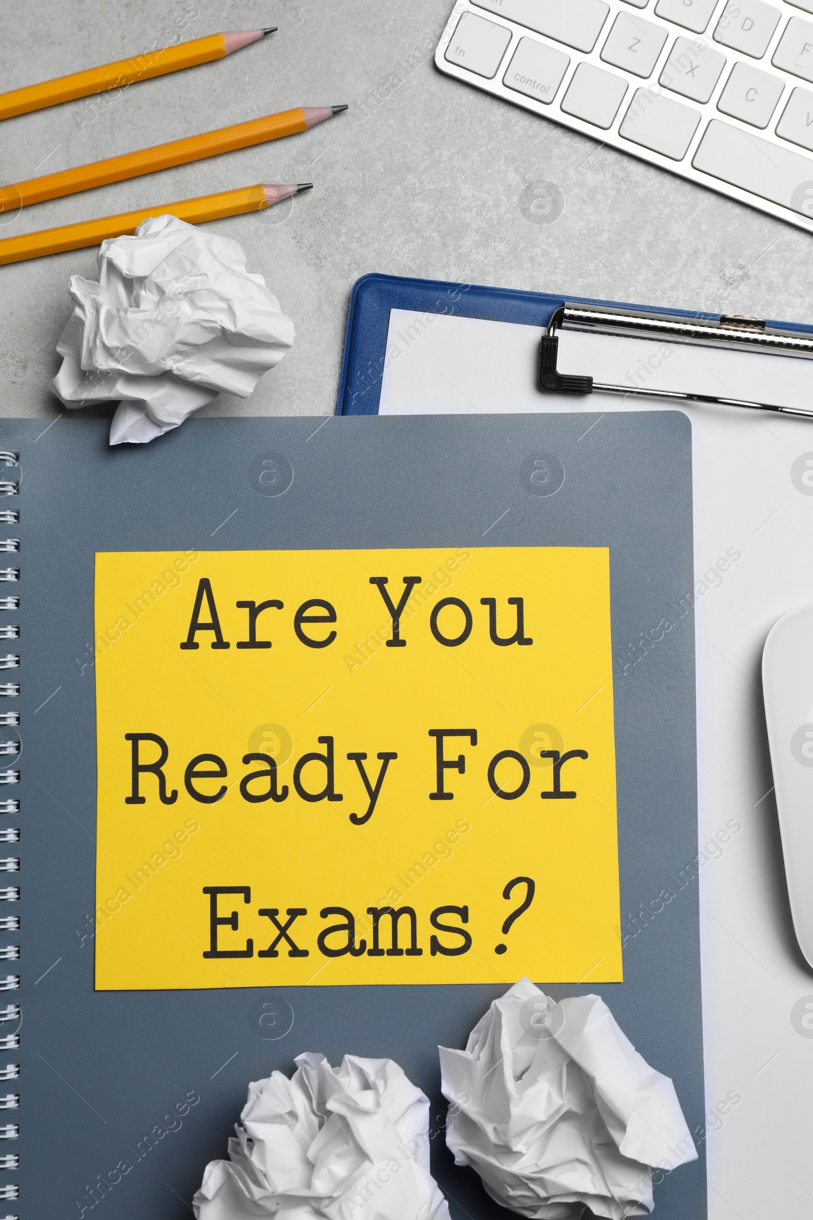 Photo of Sheet of paper with question Are You Ready For Exams? on grey table, flat lay