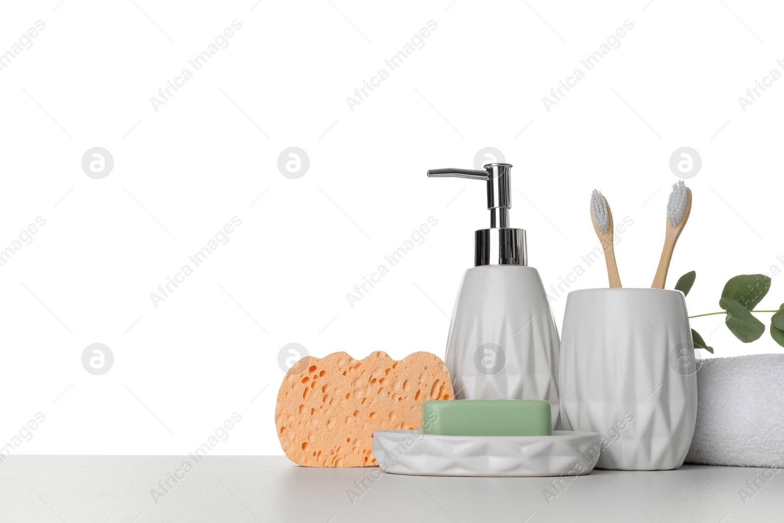 Photo of Bath accessories. Different personal care products on table against white background. Space for text