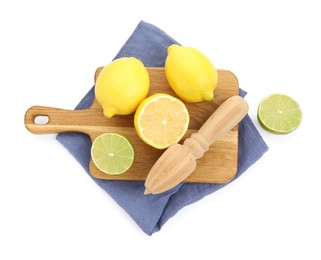 Photo of Wooden citrus reamer, fresh lemons and lime on white background, top view