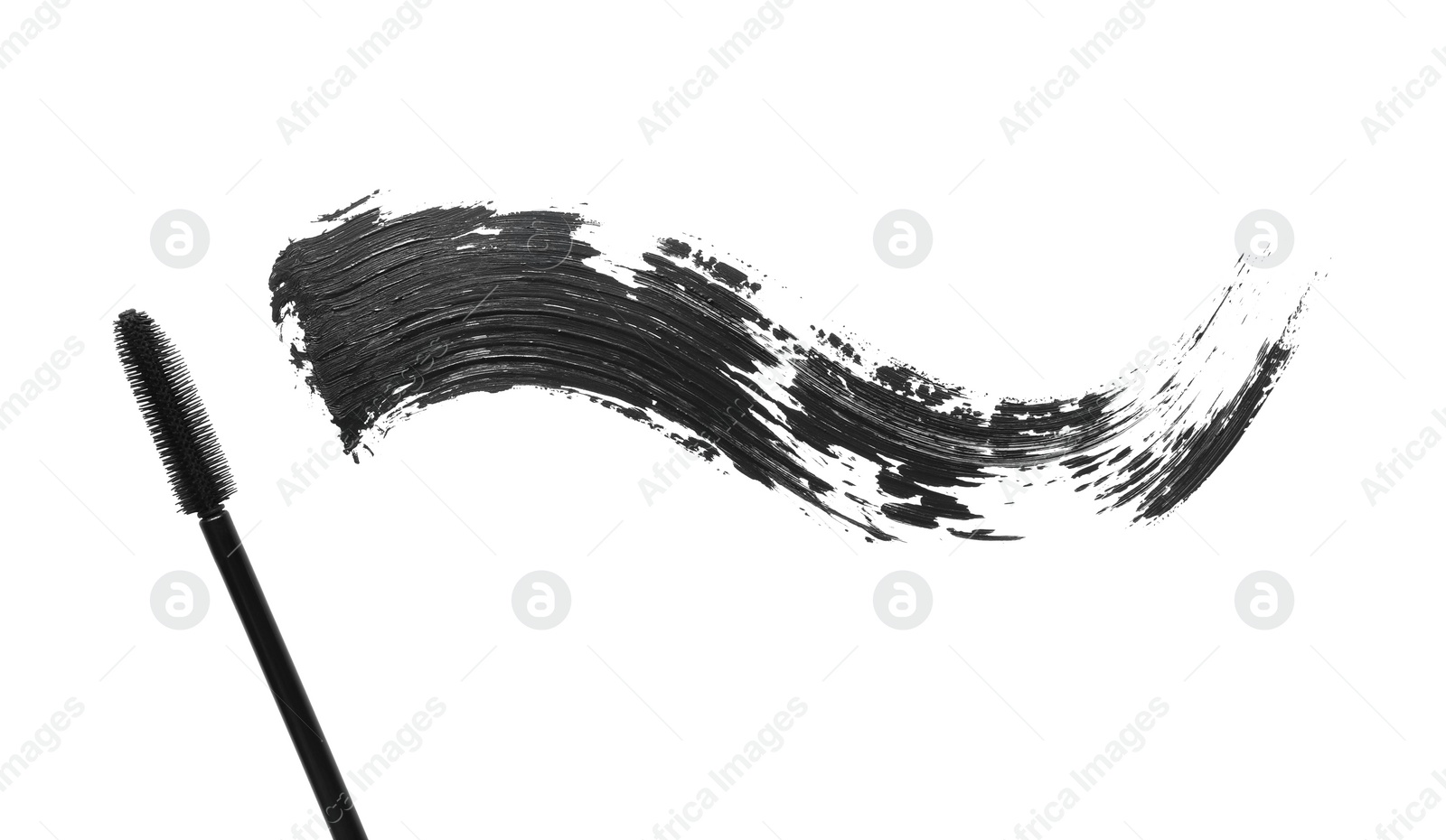 Photo of Smear of mascara and applicator isolated on white, top view