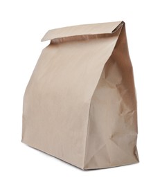 Photo of Closed kraft paper bag isolated on white