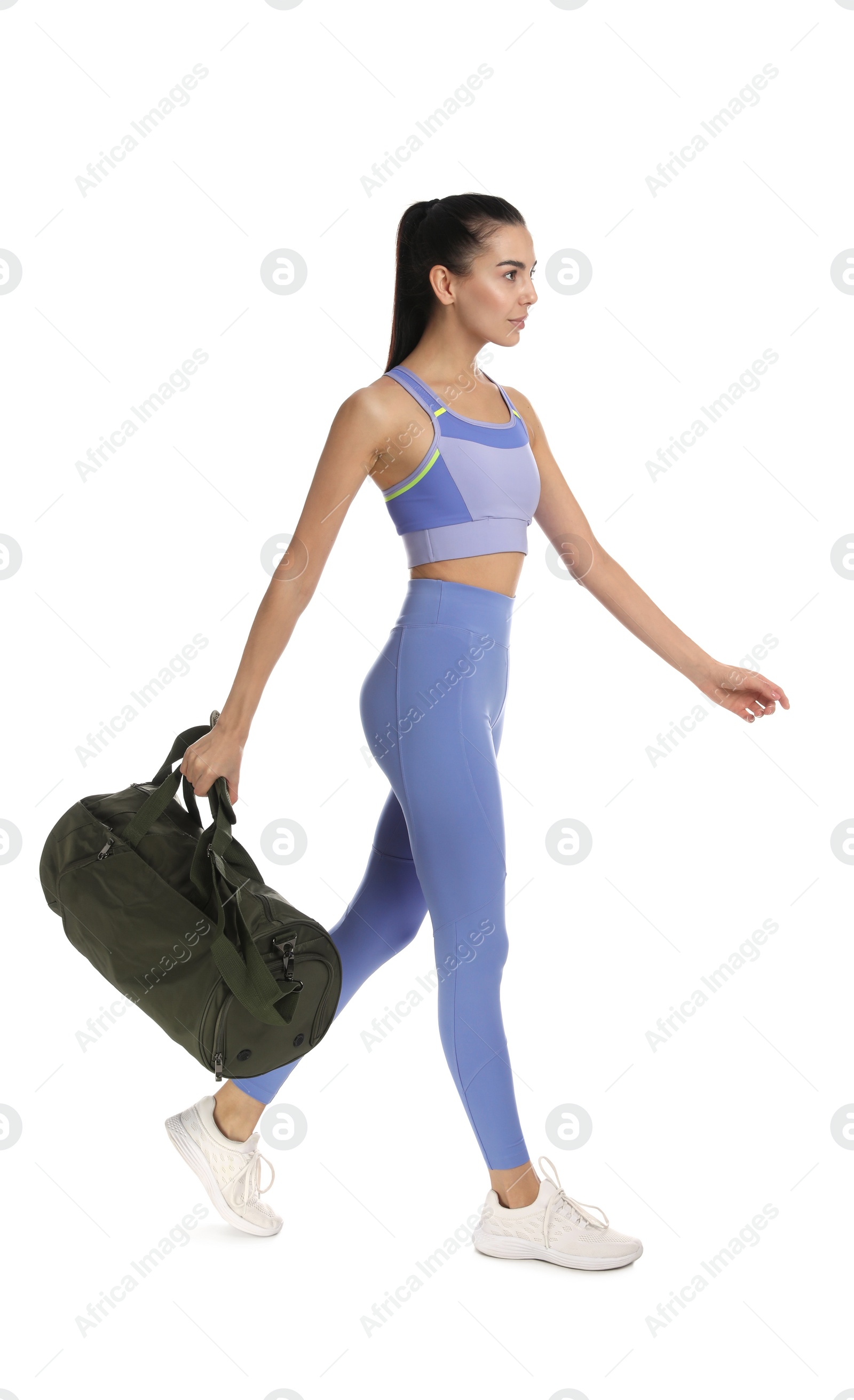 Photo of Beautiful woman with sports bag on white background