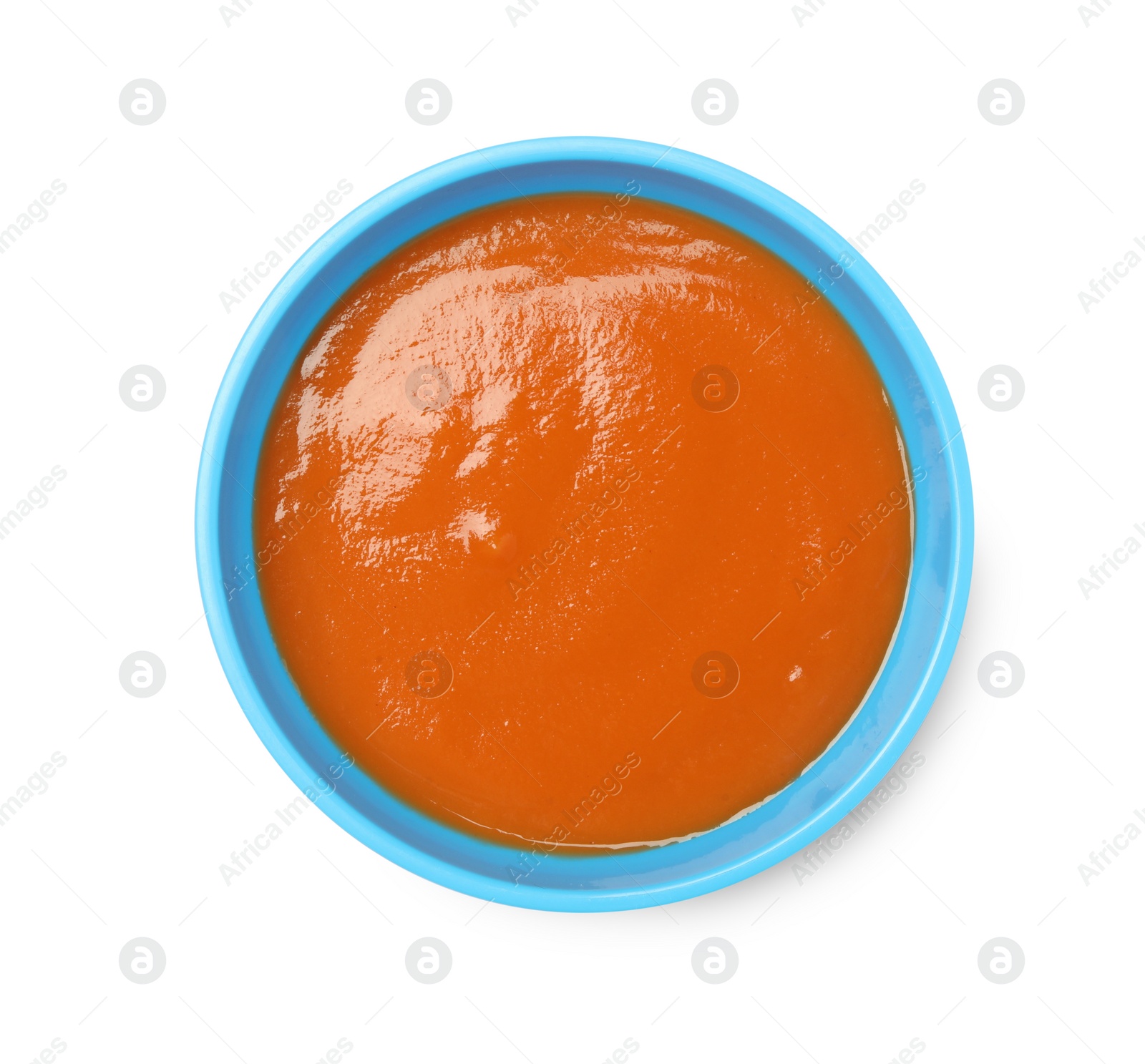 Photo of Delicious baby food in bowl isolated on white, top view