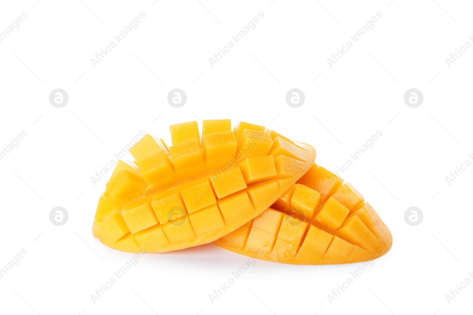 Photo of Fresh juicy mango halves on white background