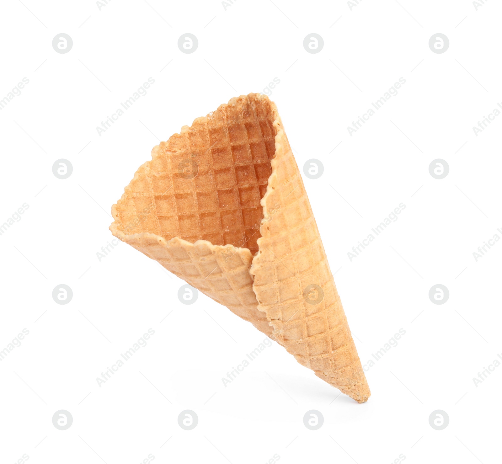 Photo of Empty wafer ice cream cone on white background