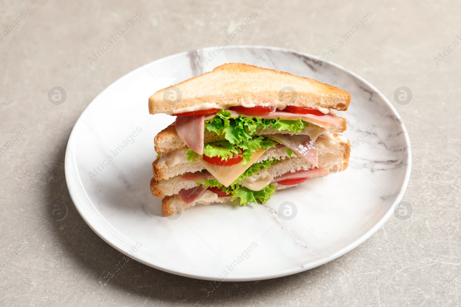 Photo of Tasty toast sandwich on plate. Wheat bread