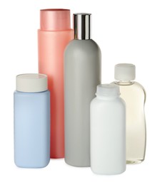 Photo of Bottles of baby cosmetic products on white background