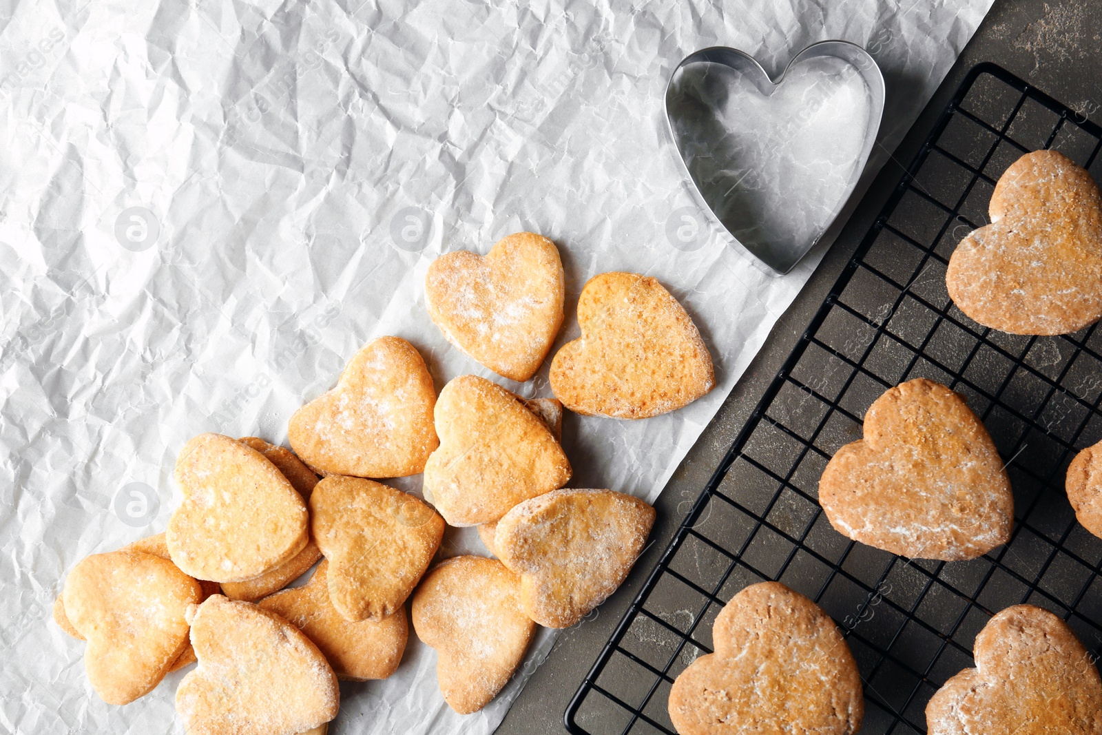 Photo of Flat lay composition with homemade heart shaped cookies on table