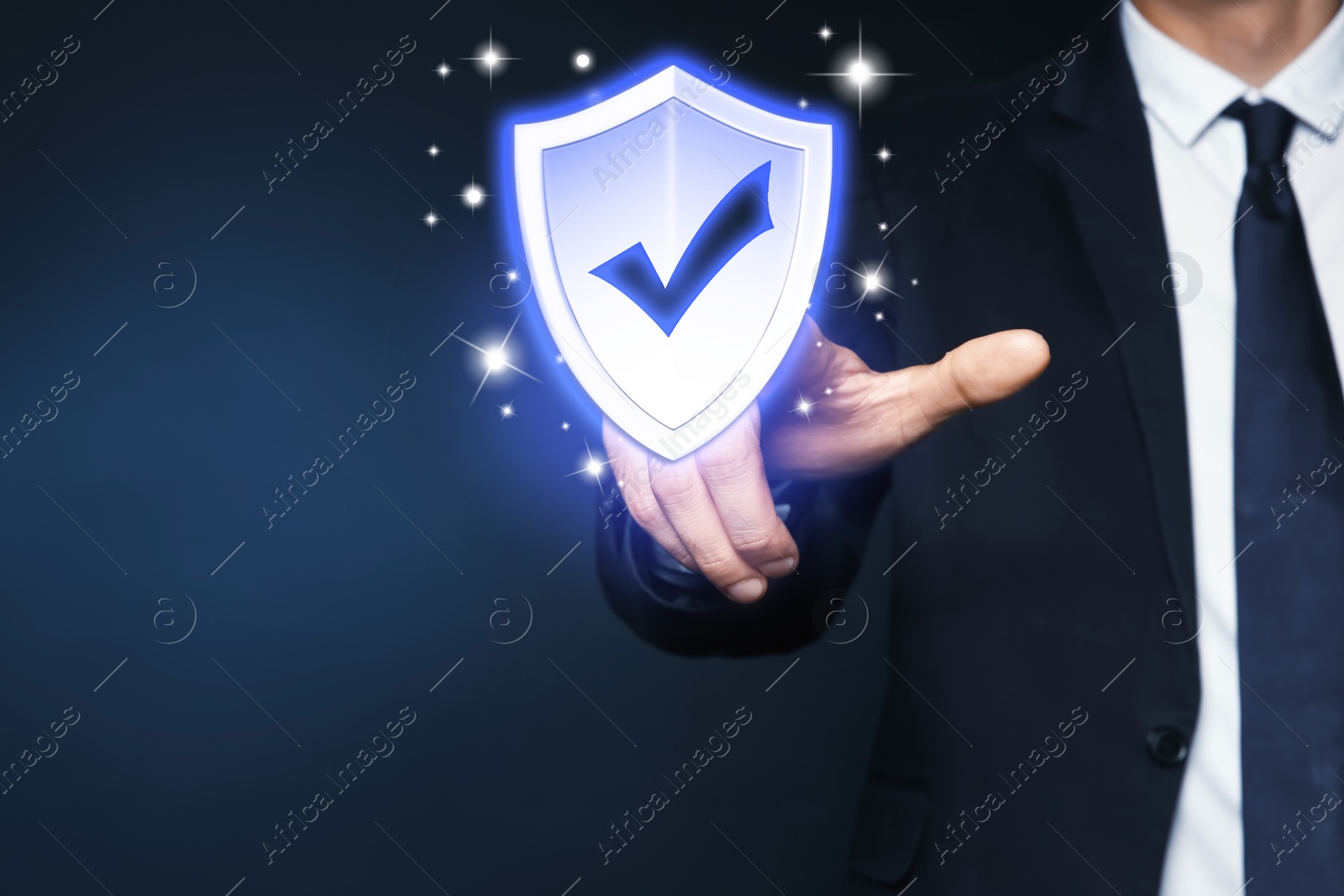 Image of Cyber insurance concept. Man using virtual screen with shield illustration as symbol of protection, closeup