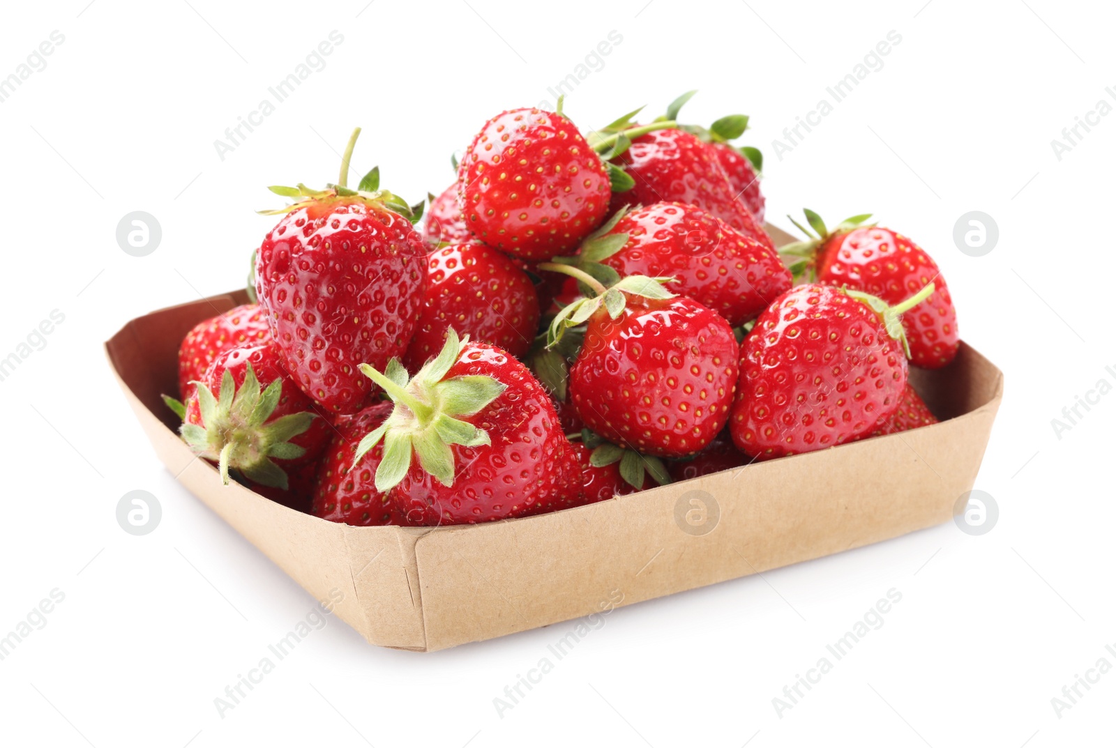 Photo of Ripe strawberries in cardboard container isolated on white