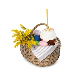 Photo of Traditional Easter cake with candle, eggs and flowers in basket isolated on white