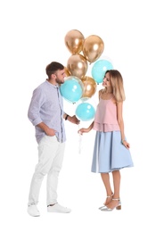 Photo of Young couple with air balloons on white background