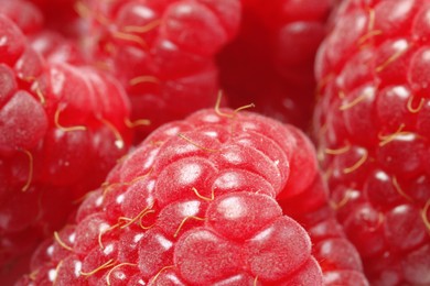Photo of Tasty fresh ripe raspberries as background, macro view. Fresh berries