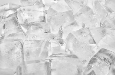 Pile of ice cubes on white background