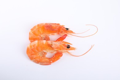 Photo of Delicious cooked shrimps isolated on white, top view