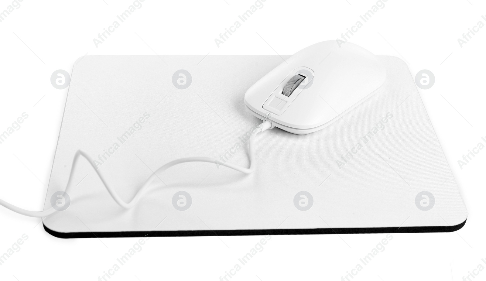 Photo of Modern wired optical mouse and pad isolated on white