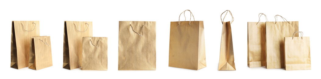 Image of Set of paper shopping bags on white background. Banner design