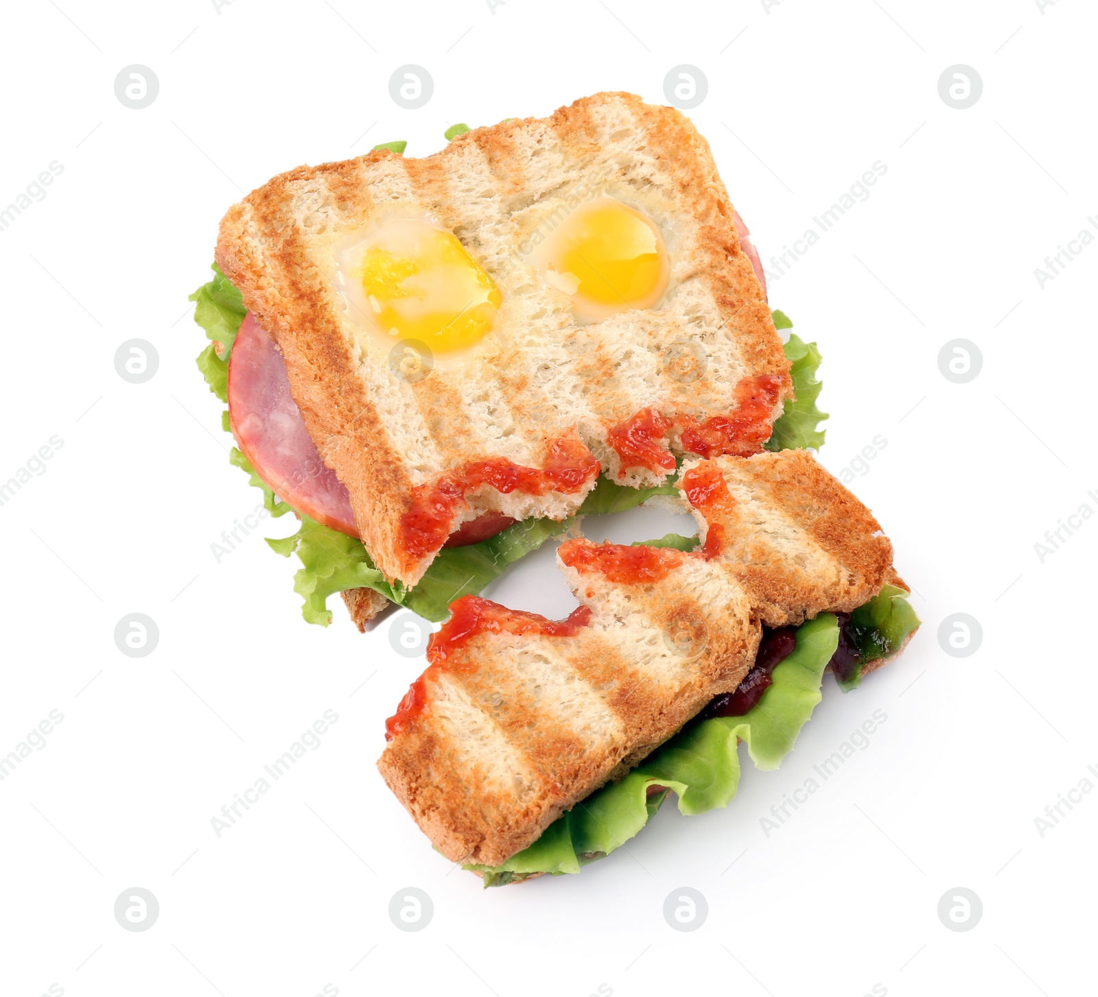 Photo of Cute monster sandwich with fried eggs isolated on white. Halloween snack