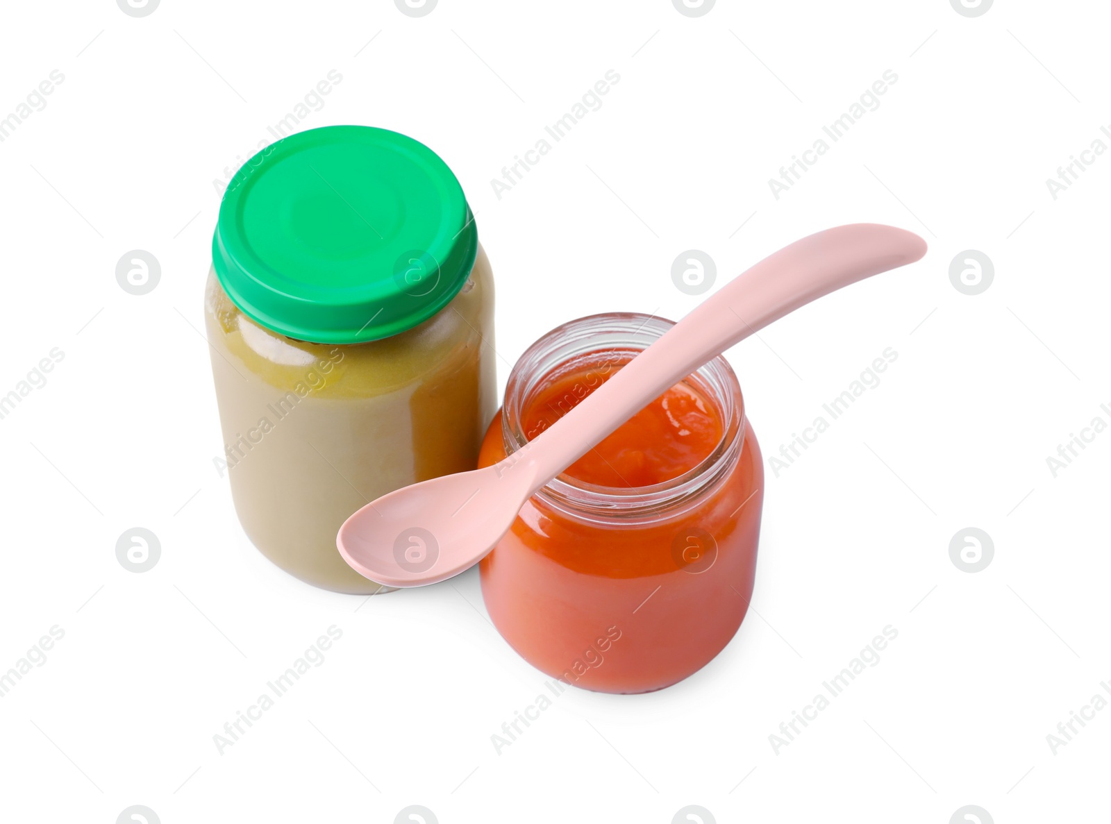 Photo of Glass jars with healthy baby food and spoon isolated on white