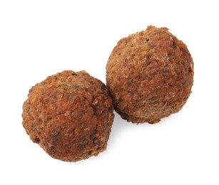 Photo of Two delicious falafel balls isolated on white, top view