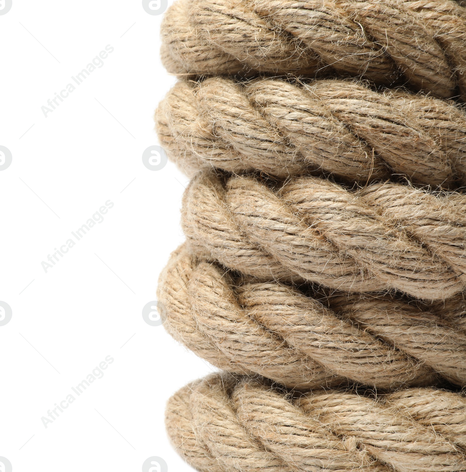 Photo of Bundle of hemp rope isolated on white, closeup