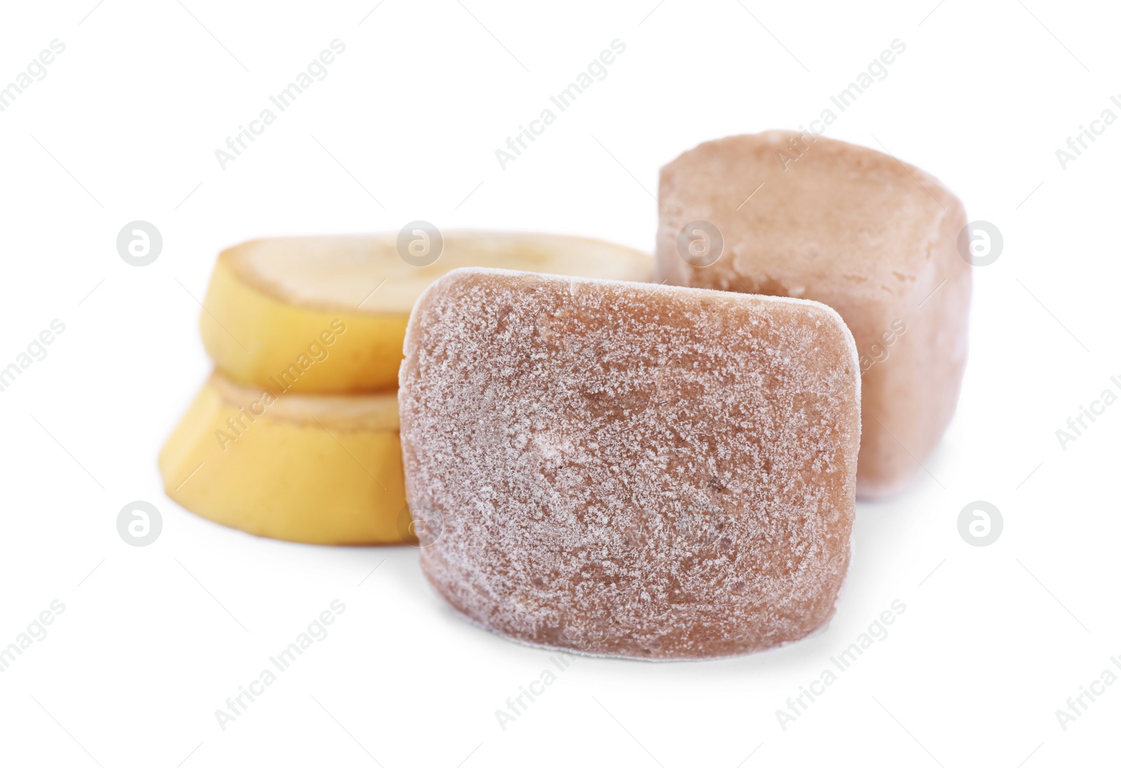 Photo of Frozen banana puree cubes and fruits on white background