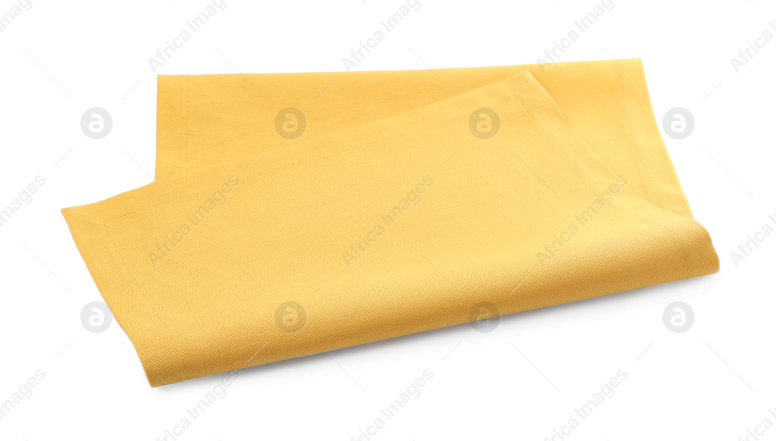 Photo of One yellow kitchen napkin isolated on white