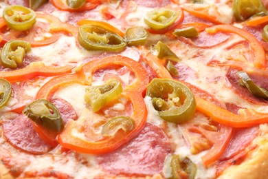 Photo of Delicious hot pizza Diablo as background, closeup