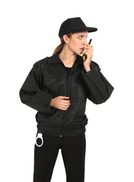Female security guard in uniform using portable radio transmitter on white background