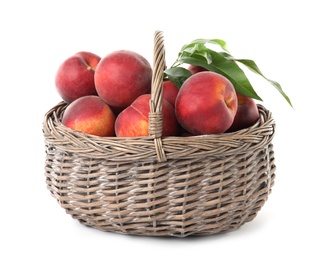 Photo of Basket of delicious ripe peaches isolated on white