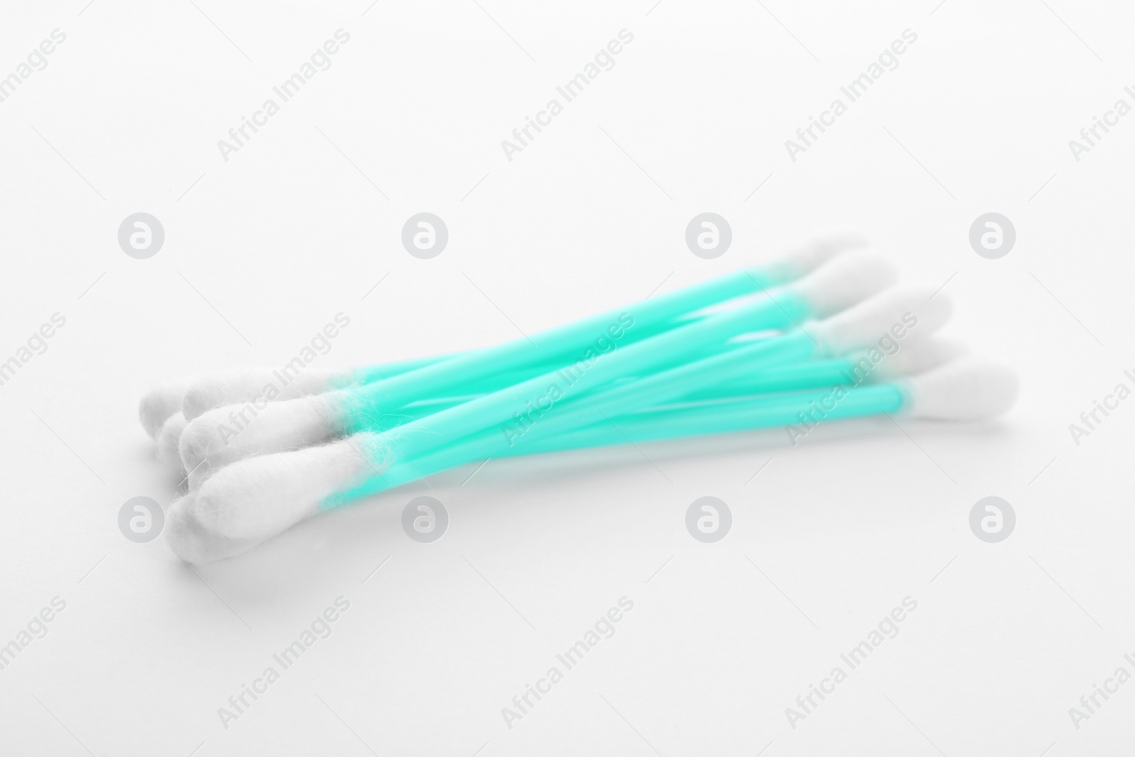 Photo of Plastic cotton swabs on white background. Hygienic accessory